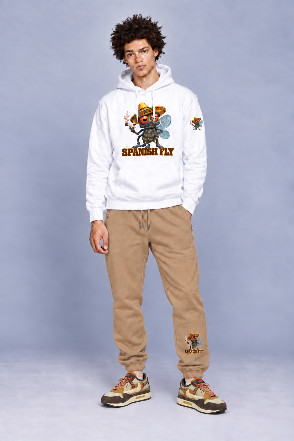 Burro Tan Spanish Fly sweatpants styled with white hoodie with fly-only Pepito left-sleeve print; items sold separately