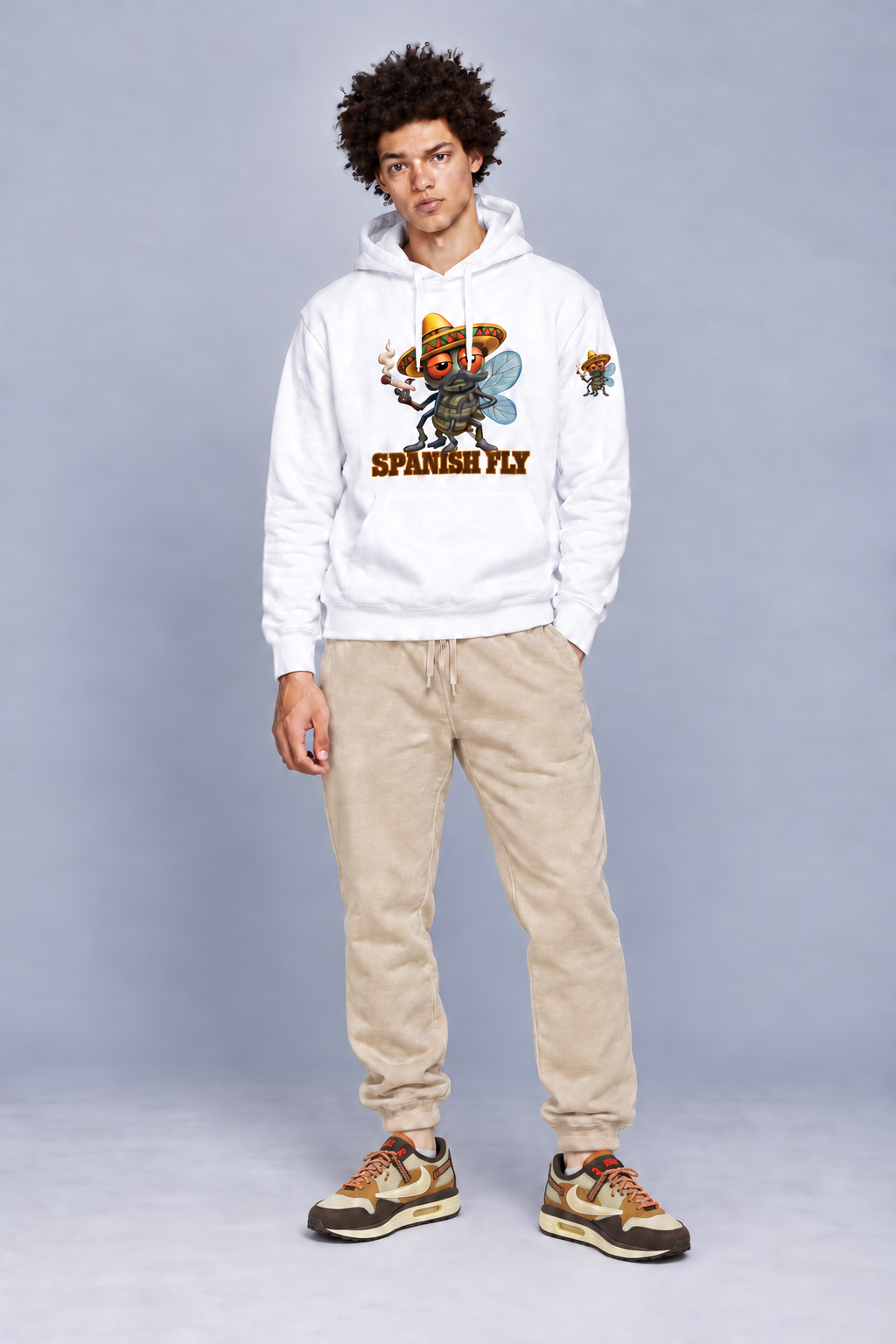 Spanish Fly hoodie White model with fly-only Pepito print on left upper sleeve; styled items sold separately
